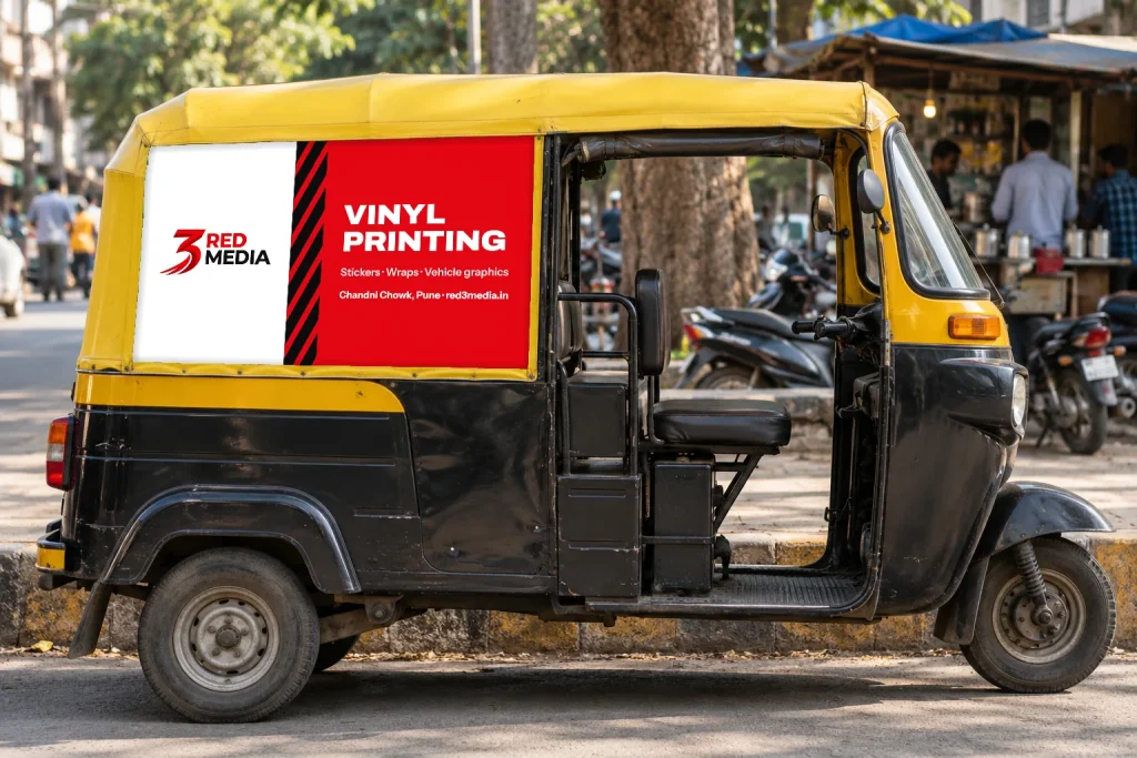 Side of a Pune auto-rickshaw hood branded with a printed vinyl panel for 3 Red Media