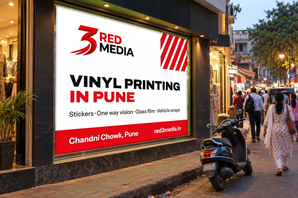 One way vision print on a Pune shop window showing a 3 Red Media advert