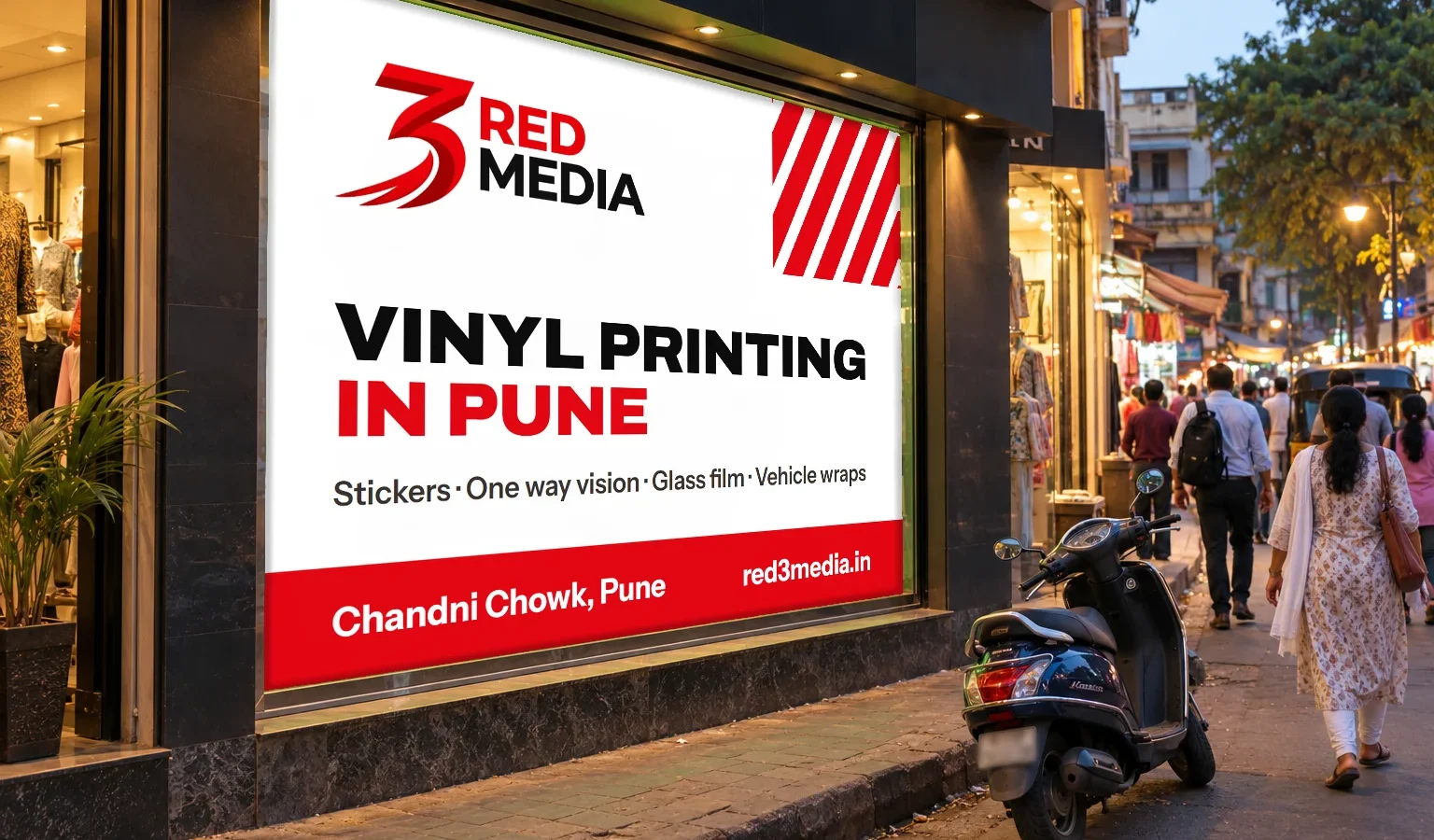 One way vision print on a Pune shop window showing a 3 Red Media advert