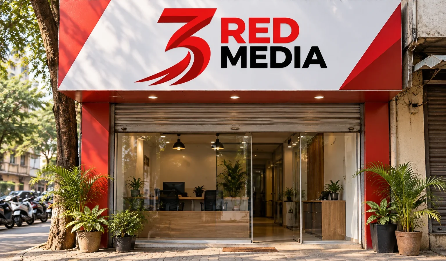 Shop front fascia board with the 3 Red Media logo in printed vinyl