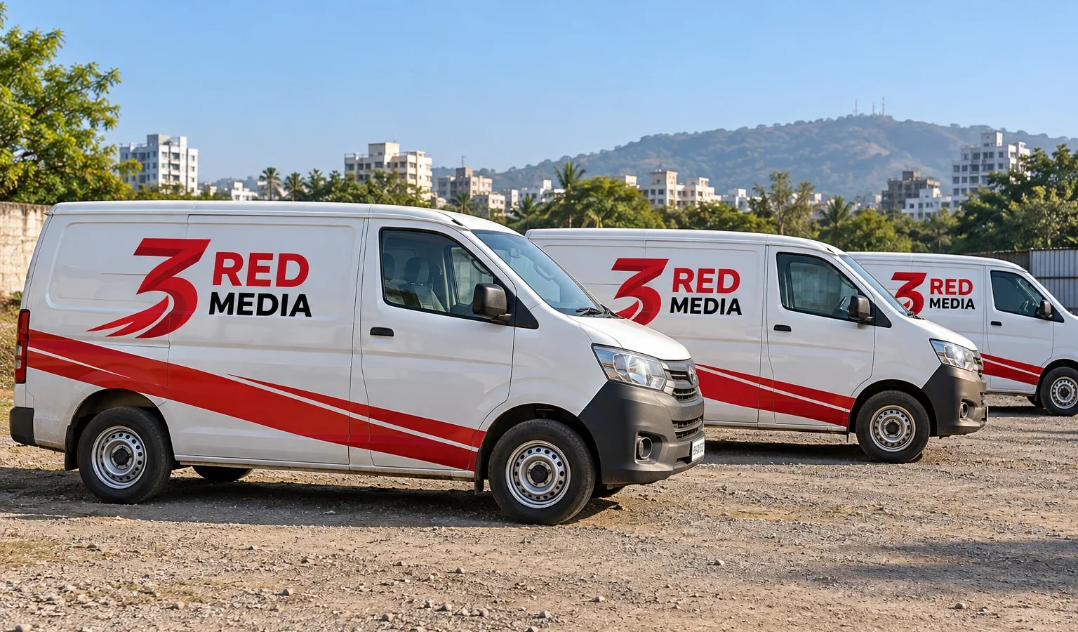 Three vans in a row with matching 3 Red Media vinyl branding